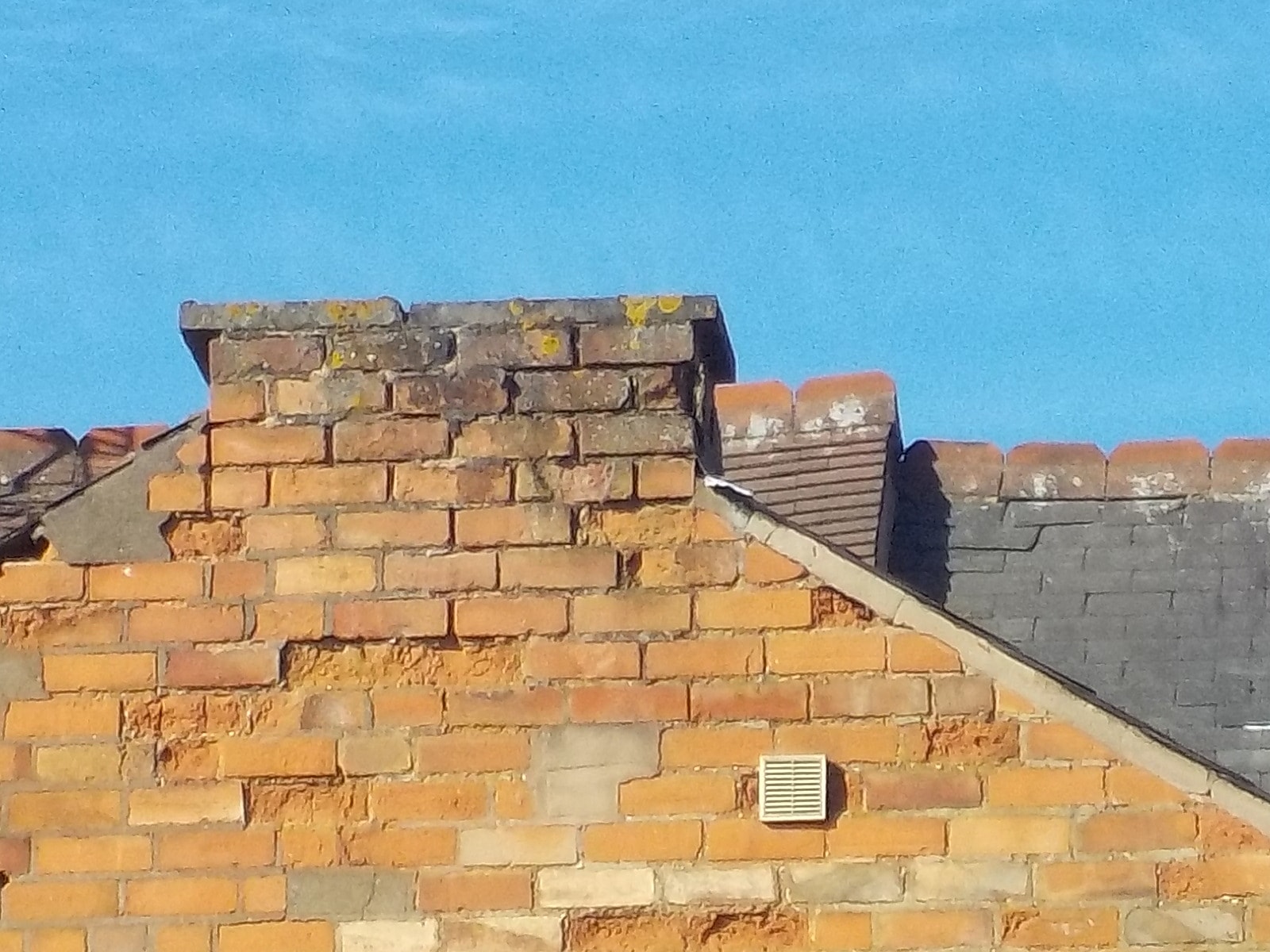 Part demolished chimney